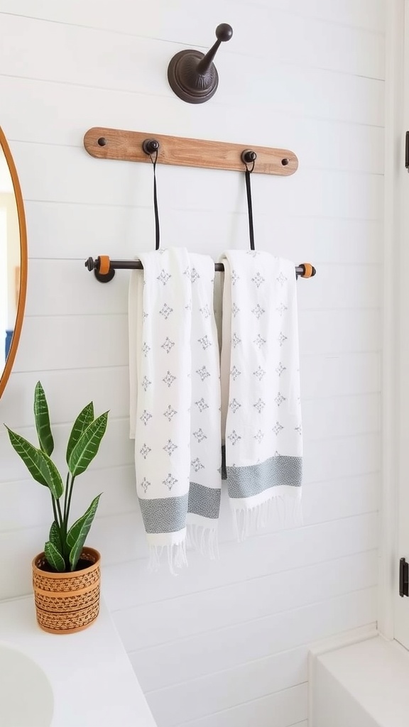 A farmhouse bathroom featuring a charming towel rack with neatly hung towels.